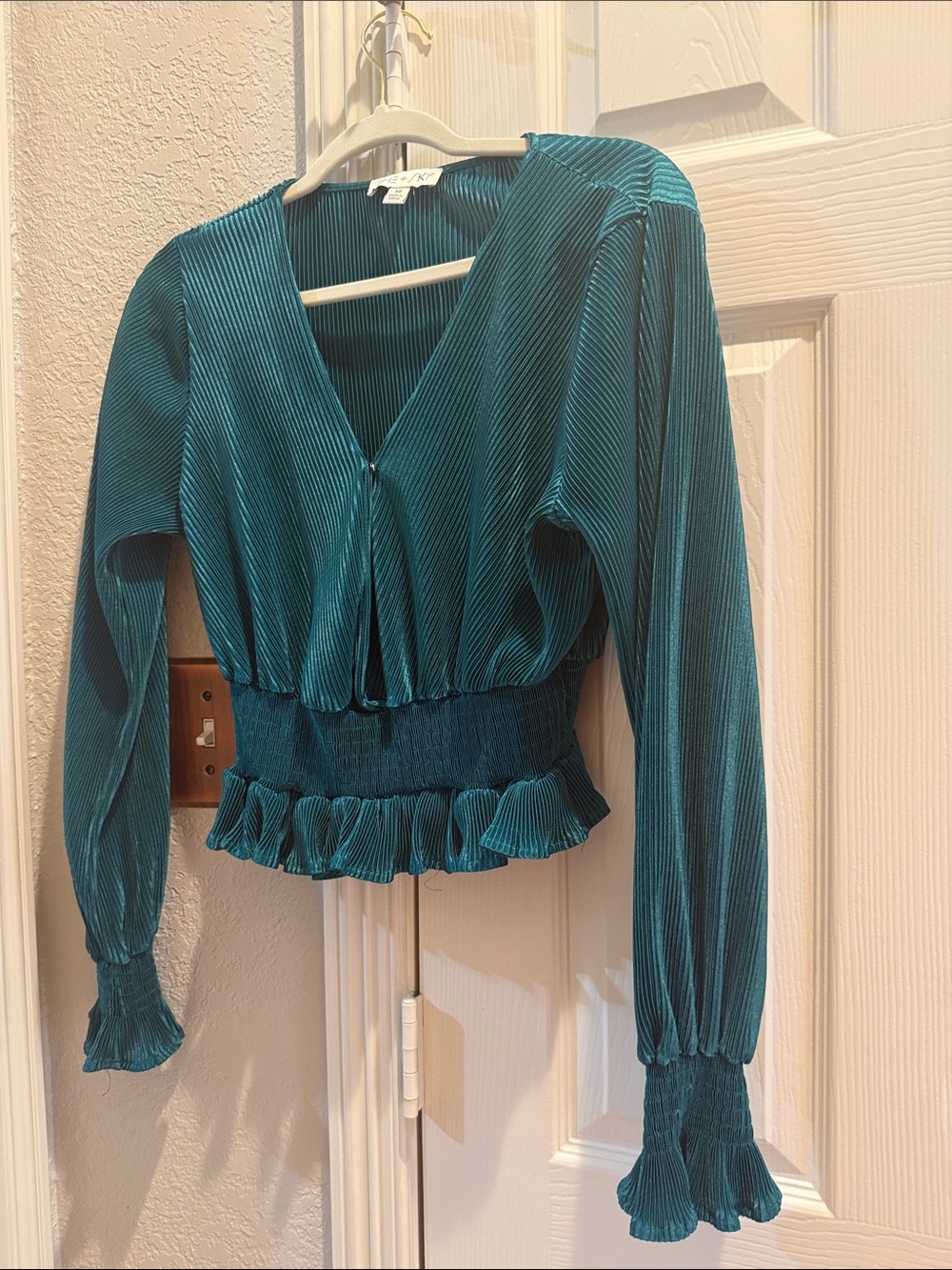 She and Sky Teal Pleated Smocked Peplum Long-Sleeve Top